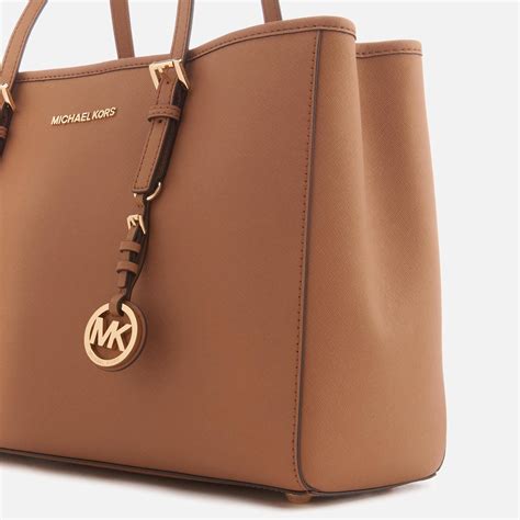 michael kors jetset large leather tote|Michael Kors bag with airplanes.